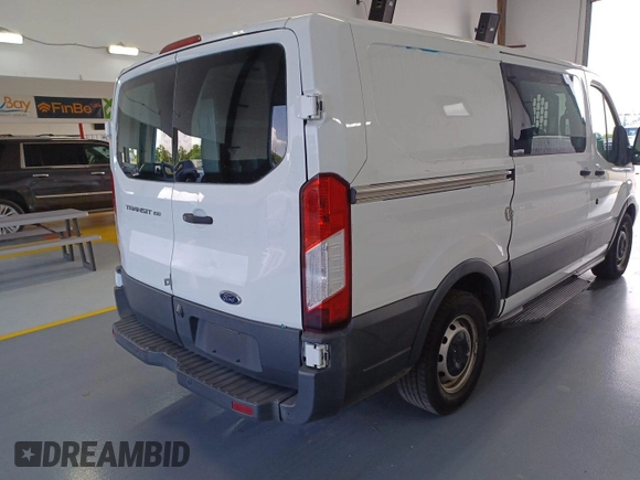 2018 Ford Transit with VIN 1FTYE1YM8JKB52177, listed as a IAAI auction lot 42564689 with 169,859 mi miles and . Bid and sale history available at DreamBid. Image 15.