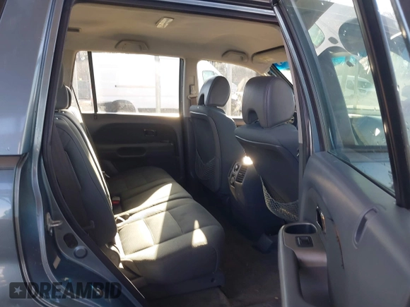 2006 Honda Pilot LX with VIN 2HKYF18156H542940, listed as a IAAI auction lot 41653949 with 152,321 mi miles and . Bid and sale history available at DreamBid. Image 8.