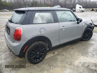 2021 MINI Hardtop Cooper with VIN WMWXR3C04M2N98103, listed as a Copart auction lot 42589255 with 61,317 mi miles and Salvage title. Bid and sale history available at DreamBid. Image 3.