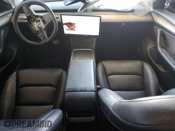 2021 Tesla Model 3 Standard Range Plus with VIN 5YJ3E1EA2MF048564, listed as a Copart auction lot 88754285 with 57,894 mi miles and Non Repairable. Bid and sale history available at DreamBid. Image 8.