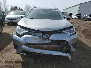 2018 Toyota RAV4 LE with VIN 2T3BFREV9JW754527, listed as a Copart auction lot 48119415 with 217,777 mi miles and Salvage Title. Bid and sale history available at carsss.com. Image 5.
