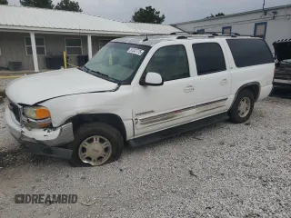 2002 GMC Yukon XL SLT z VIN 1GKEC16Z82J332228, wystawiony jako Copart lot #57347775 z przebiegiem 296 994 mil mil oraz Szkoda całkowita • Salvage title. Historia ofert i sprzedaży dostępna na DreamBid. Obrazek 1.