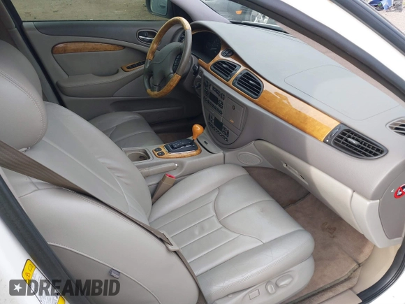 2002 Jaguar S-Type with VIN SAJDA01P12GM35163, listed as a IAAI auction lot 41097415 with 114,017 mi miles and . Bid and sale history available at DreamBid. Image 5.