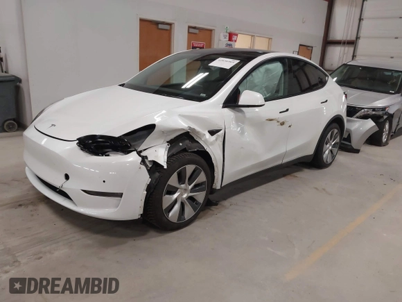 2022 Tesla Model Y Long Range z VIN 7SAYGDEE3NF358487, wystawiony jako IAAI lot #42036969 z przebiegiem 52 723 mil mil oraz . Historia ofert i sprzedaży dostępna na DreamBid. Obrazek 19.