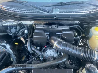 2014 Ford F-150 SVT Raptor with VIN 1FTFW1R67EFC35912, listed as a Copart auction lot 55183265 with 187,461 mi miles and Salvage Title. Bid and sale history available at carsss.com. Image 7.