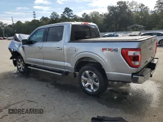 2023 Ford F-150 XL with VIN 1FTFW1E83PFC67461, listed as a Copart auction lot 81063714 with 10,498 mi miles and Salvage Title. Bid and sale history available at carsss.com. Image 2.