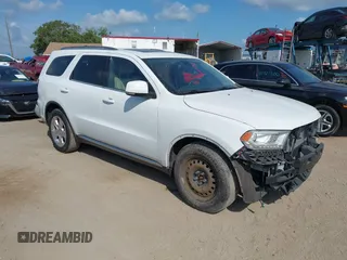 2014 Dodge Durango Limited z VIN 1C4RDJDGXEC323129, wystawiony jako IAAI lot #42318727 z przebiegiem 148 451 mil mil oraz . Historia ofert i sprzedaży dostępna na DreamBid. Obrazek 1.