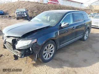2013 Lincoln MKT EcoBoost with VIN 2LMHJ5AT6DBL55328, listed as a IAAI auction lot 41806881 with 72,740 mi miles. Bid and sale history available at carsss.com. Image 18.