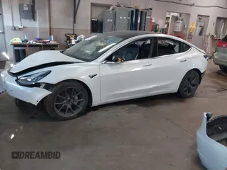 2020 Tesla Model 3 Long Range z VIN 5YJ3E1EB7LF619120, wystawiony jako IAAI lot #41334485 z przebiegiem Nie podano mil oraz . Historia ofert i sprzedaży dostępna na DreamBid. Obrazek 18.