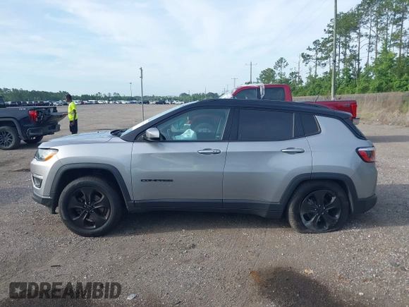 2018 Jeep Compass Latitude with VIN 3C4NJDBBXJT402489, listed as a IAAI auction lot 42369108 with 126,939 mi miles and . Bid and sale history available at DreamBid. Image 14.