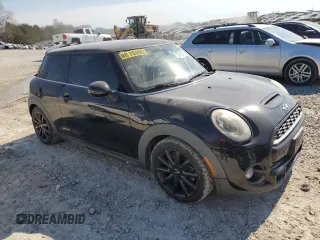 2016 MINI Hardtop S with VIN WMWXP7C55G3B49216, listed as a Copart auction lot 50579275 with 107,977 mi miles and Salvage Title. Bid and sale history available at DreamBid. Image 4.