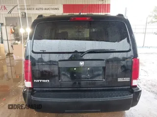 2007 Dodge Nitro SXT with VIN 1D8GT28K67W683600, listed as a IAAI auction lot 40958011 with 70,141 mi miles. Bid and sale history available at carsss.com. Image 16.