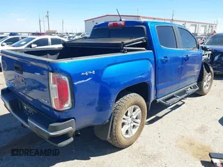 2019 GMC Canyon 4WD SLE z VIN 1GTG6CENXK1222416, wystawiony jako IAAI lot #41878077 z przebiegiem 85 415 mil mil oraz . Historia ofert i sprzedaży dostępna na DreamBid. Obrazek 4.