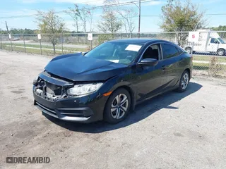 2017 Honda Civic Sedan LX with VIN 19XFC2F57HE061090, listed as a IAAI auction lot 41887402 with 129,167 mi miles. Bid and sale history available at carsss.com. Image 2.