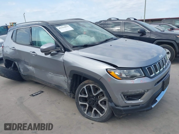 2018 Jeep Compass Limited with VIN 3C4NJCCBXJT499864, listed as a IAAI auction lot 42319832 with 94,893 mi miles and . Bid and sale history available at DreamBid. Image 1.