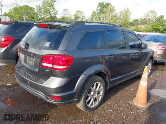 2014 Dodge Journey SXT with VIN 3C4PDCBB3ET172374, listed as a IAAI auction lot 42188228 with 138,129 mi miles. Bid and sale history available at carsss.com. Image 4.