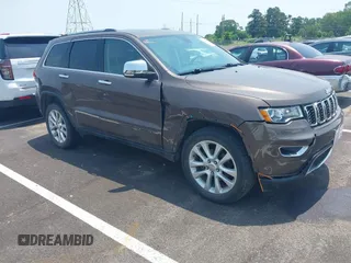 2017 Jeep Grand Cherokee Limited z VIN 1C4RJFBG5HC837032, wystawiony jako IAAI lot #42440461 z przebiegiem 130 597 mil mil oraz . Historia ofert i sprzedaży dostępna na DreamBid. Obrazek 1.