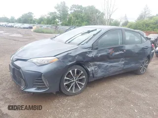 2017 Toyota Corolla L z VIN 5YFBURHE7HP633484, wystawiony jako IAAI lot #42538243 z przebiegiem 80 492 mil mil oraz . Historia ofert i sprzedaży dostępna na DreamBid. Obrazek 17.