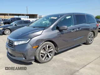 2023 Honda Odyssey Touring with VIN 5FNRL6H89PB053593, listed as a Copart auction lot 64836685 with 26,568 mi miles and Salvage title. Bid and sale history available at DreamBid. Image 1.