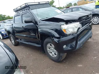 2014 Toyota Tacoma with VIN 5TFLU4EN2EX090635, listed as a IAAI auction lot 42381586 with 147,839 mi miles and . Bid and sale history available at DreamBid. Image 1.