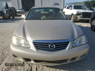 2001 Mazda Millenia z VIN JM1TA221911716600, wystawiony jako Copart lot #57639185 z przebiegiem 86 947 mil mil oraz Tytuł czysty. Historia ofert i sprzedaży dostępna na DreamBid. Obrazek 5.