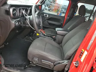 2023 Jeep Wrangler Sport with VIN 1C4HJXDG5PW527992, listed as a Copart auction lot 73312234 with 32,686 mi miles and Salvage Title. Bid and sale history available at DreamBid. Image 7.