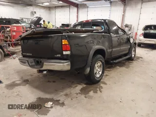 2001 Toyota Tundra SR5 with VIN 5TBRT34131S169696, listed as a IAAI auction lot 41481456 with 215,679 mi miles and . Bid and sale history available at DreamBid. Image 4.