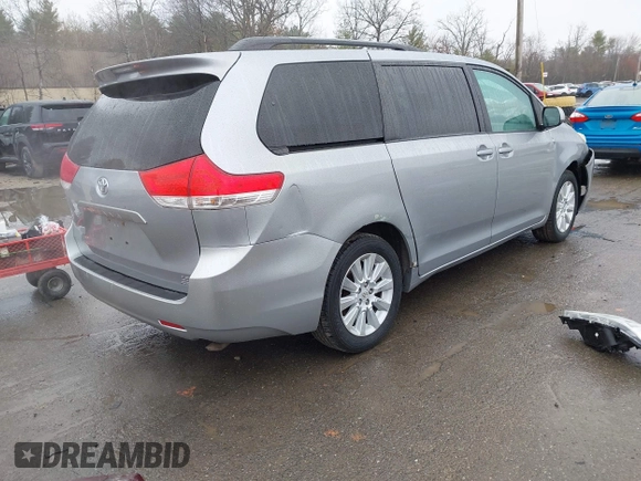 2012 Toyota Sienna LE with VIN 5TDJK3DCXCS040253, listed as a IAAI auction lot 41957623 with 164,780 mi miles. Bid and sale history available at carsss.com. Image 4.