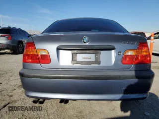 2003 BMW 3 Series 325i with VIN WBAET37423NJ39395, listed as a Copart auction lot 85048954 with 180,149 mi miles and Salvage Title. Bid and sale history available at carsss.com. Image 6.