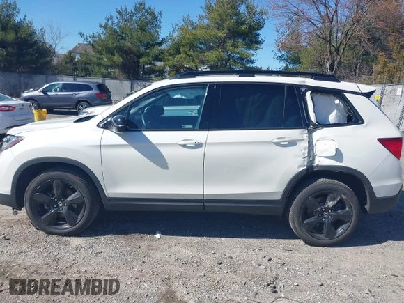 2019 Honda Passport Elite z VIN 5FNYF8H04KB005307, wystawiony jako IAAI lot #41828725 z przebiegiem 61 864 mil mil oraz . Historia ofert i sprzedaży dostępna na DreamBid. Obrazek 14.