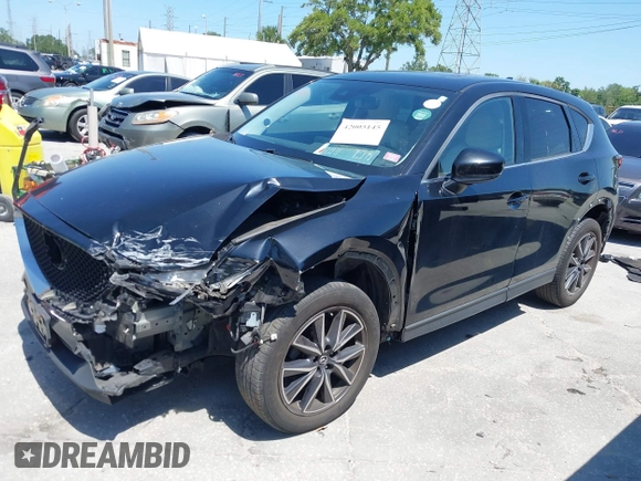 2017 Mazda CX-5 Grand Touring with VIN JM3KFBDL6H0200830, listed as a IAAI auction lot 42005145 with 90,510 mi miles. Bid and sale history available at carsss.com. Image 17.