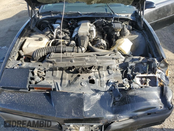 1989 Pontiac Firebird z VIN 1G2FS2186KL212458, wystawiony jako Copart lot #56995025 z przebiegiem 89 851 mil mil oraz Szkoda całkowita • Salvage title. Historia ofert i sprzedaży dostępna na DreamBid. Obrazek 11.