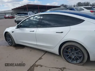 2021 Tesla Model 3 Long Range with VIN 5YJ3E1EB9MF059554, listed as a IAAI auction lot 41231520 with 63,696 mi miles and . Bid and sale history available at DreamBid. Image 13.