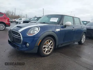 2015 MINI Hardtop 4 Door S with VIN WMWXU3C58FT892238, listed as a IAAI auction lot 41104432 with 156,722 mi miles and . Bid and sale history available at DreamBid. Image 18.
