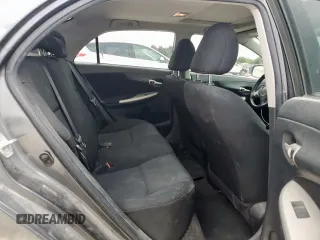 2010 Toyota Corolla z VIN 2T1BU4EE2AC497519, wystawiony jako Copart lot #64614915 z przebiegiem 183 890 mil mil oraz Szkoda całkowita • Salvage title. Historia ofert i sprzedaży dostępna na DreamBid. Obrazek 10.
