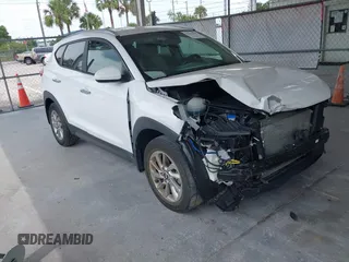 2016 Hyundai Tucson SE z VIN KM8J33A48GU192135, wystawiony jako IAAI lot #42216339 z przebiegiem 79 283 mil mil oraz . Historia ofert i sprzedaży dostępna na DreamBid. Obrazek 1.