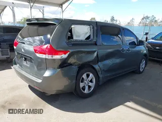 2014 Toyota Sienna L with VIN 5TDZK3DC6ES441417, listed as a IAAI auction lot 41950033 with 170,804 mi miles. Bid and sale history available at carsss.com. Image 4.