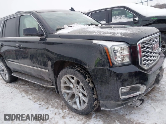 2020 GMC Yukon Denali with VIN 1GKS2CKJ5LR301216, listed as a IAAI auction lot 41439076 with 76,129 mi miles. Bid and sale history available at carsss.com. Image 1.
