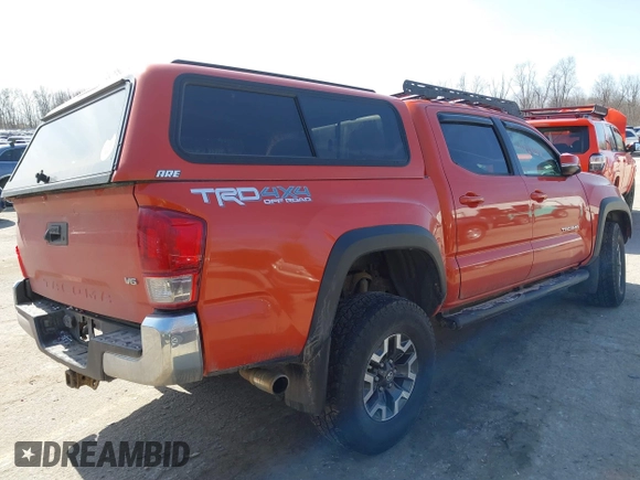 2016 Toyota Tacoma SR with VIN 3TMCZ5AN0GM001120, listed as a IAAI auction lot 41769108 with 190,635 mi miles and . Bid and sale history available at DreamBid. Image 4.