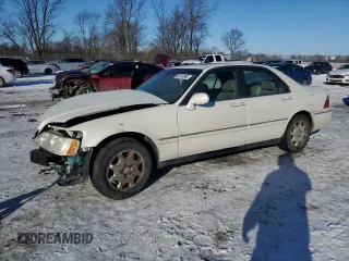 2000 Acura RL with VIN JH4KA9651YC013698, listed as a Copart auction lot 88797885 with 0 mi miles and Salvage Title. Bid and sale history available at carsss.com. Image 1.
