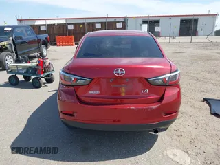 2016 Scion iA z VIN 3MYDLBZV0GY118621, wystawiony jako IAAI lot #42342512 z przebiegiem 71 193 mil mil oraz . Historia ofert i sprzedaży dostępna na DreamBid. Obrazek 17.