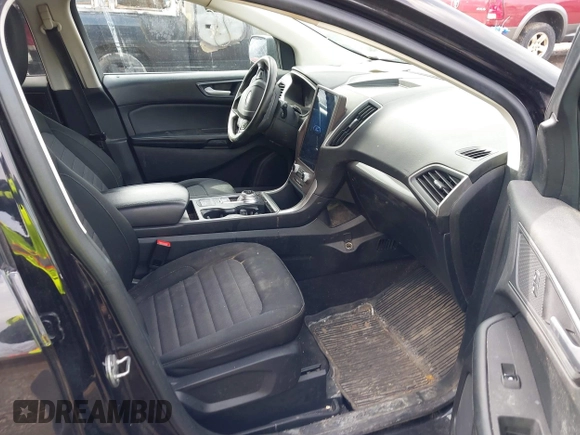 2021 Ford Edge SE z VIN 2FMPK4G9XMBA15819, wystawiony jako IAAI lot #41921371 z przebiegiem 63 373 mil mil oraz . Historia ofert i sprzedaży dostępna na DreamBid. Obrazek 5.