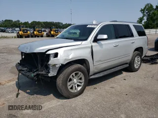 2018 Chevrolet Tahoe LT with VIN 1GNSKBKC7JR382344, listed as a Copart auction lot 58768135 with 103,557 mi miles and Salvage title. Bid and sale history available at DreamBid. Image 1.
