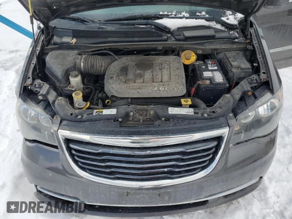 2015 Chrysler Town & Country S with VIN 2C4RC1HG2FR725832, listed as a Copart auction lot 41791145 with 196,273 mi miles and Clean Title. Bid and sale history available at DreamBid. Image 12.