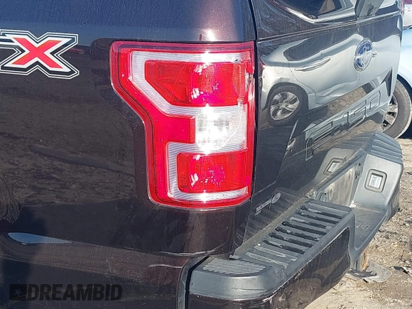 2018 Ford F-150 XL with VIN 1FTEW1C50JFA26307, listed as a IAAI auction lot 41091268 with 129,012 mi miles and . Bid and sale history available at DreamBid. Image 19.