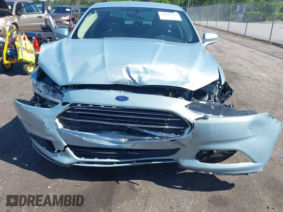 2014 Ford Fusion SE Hybrid with VIN 3FA6P0LU3ER373311, listed as a IAAI auction lot 42048513 with 155,935 mi miles. Bid and sale history available at carsss.com. Image 6.