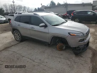 2017 Jeep Cherokee Latitude with VIN 1C4PJMCS1HW617979, listed as a Copart auction lot 84250714 with 105,987 mi miles and Salvage Title. Bid and sale history available at DreamBid. Image 4.