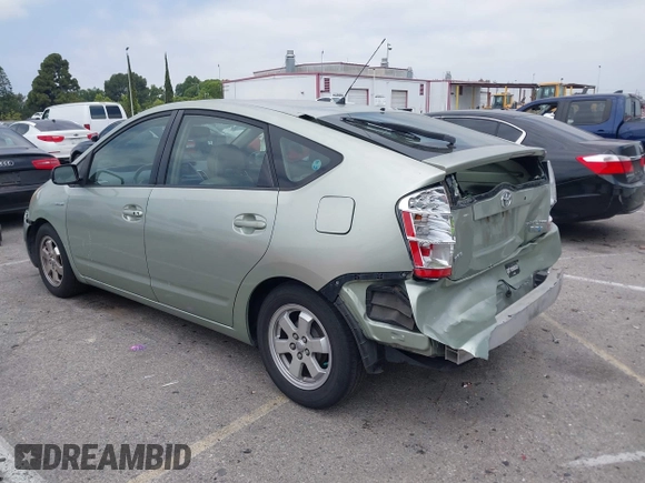 2007 Toyota Prius z VIN JTDKB20U477626959, wystawiony jako IAAI lot #42272184 z przebiegiem 179 443 mil mil oraz . Historia ofert i sprzedaży dostępna na DreamBid. Obrazek 3.