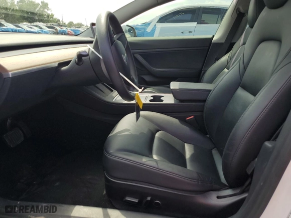 2021 Tesla Model 3 Standard Range Plus with VIN 5YJ3E1EA0MF920949, listed as a Copart auction lot 51477485 with 58,196 mi miles and Non Repairable. Bid and sale history available at carsss.com. Image 7.