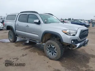 2017 Toyota Tacoma SR5 with VIN 3TMCZ5AN8HM051829, listed as a IAAI auction lot 41616329 with 64,113 mi miles and . Bid and sale history available at carsss.com. Image 1.